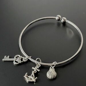 Silver Charm Bracelet with Key, Anchor, and Shell